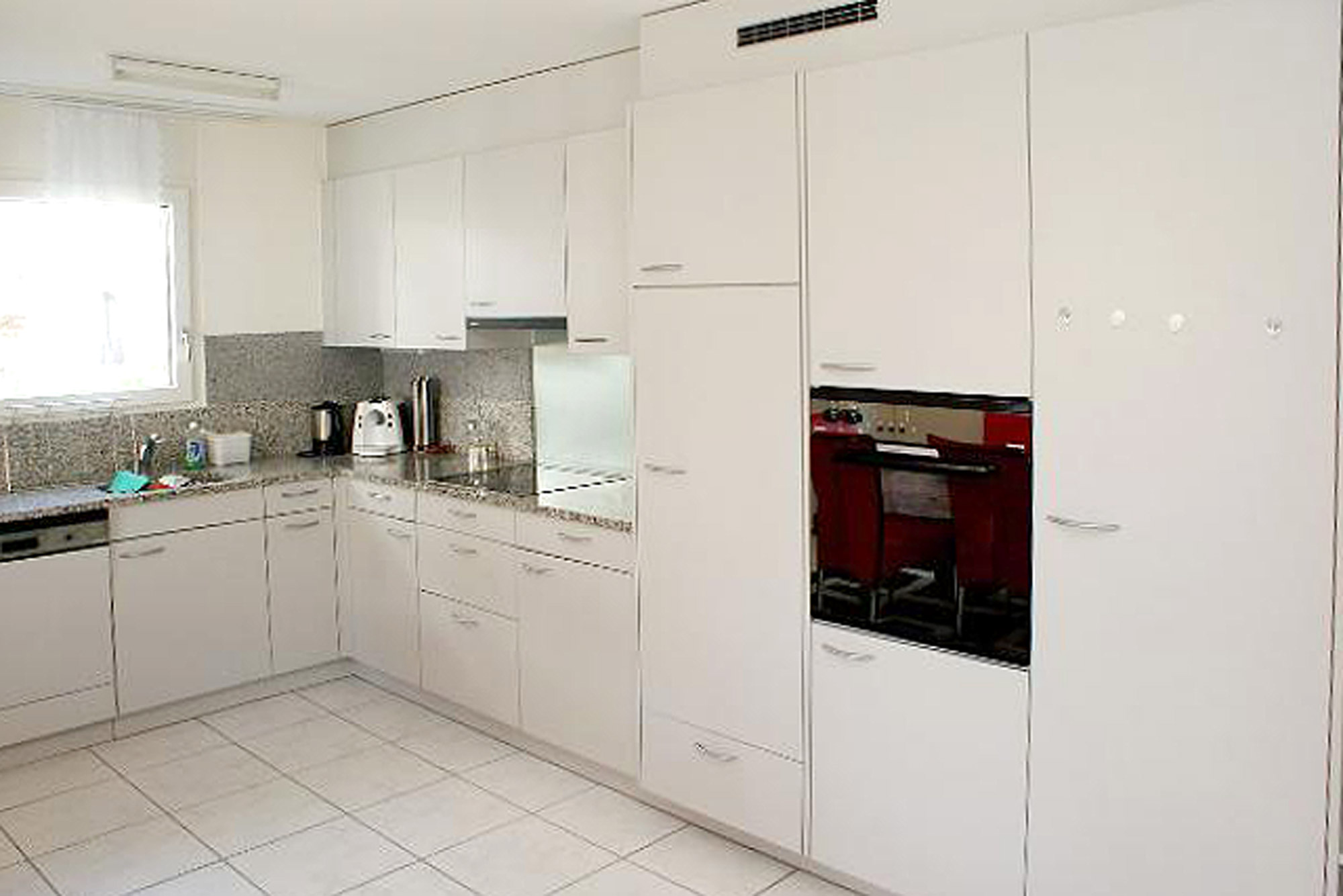 esco immo GmbH | Verkaufsobjekt | Grosszügige, moderne 5.5 Zimmer-Eigentumswohnung | Küche esco immo GmbH | Verkaufsobjekt | Grosszügige, moderne 5.5 Zimmer-Eigentumswohnung | Küche